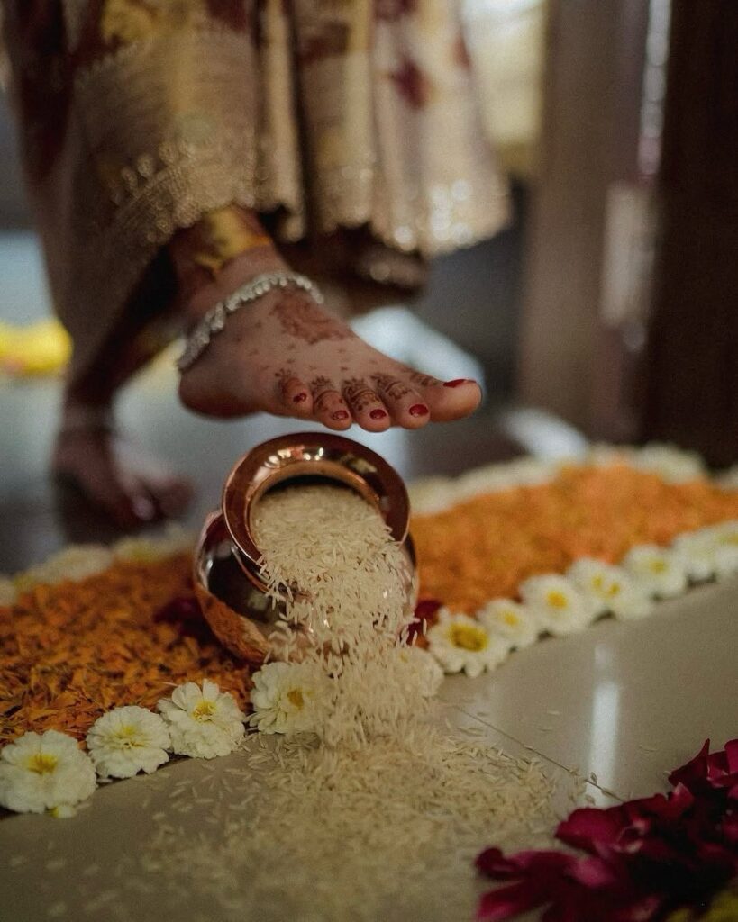 Traditional grah pravesh ritual after wedding ceremony
